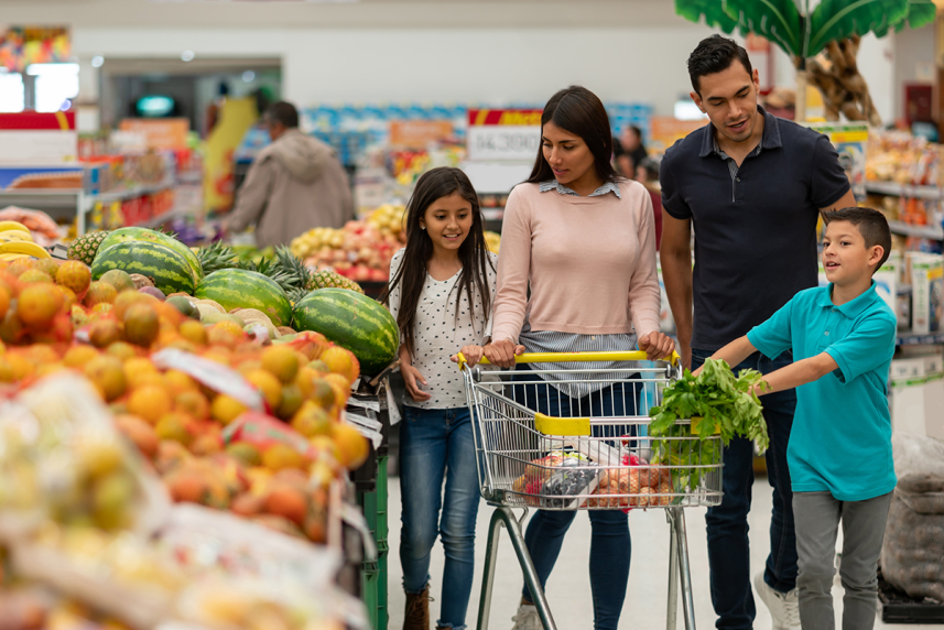 A family shops for groceries