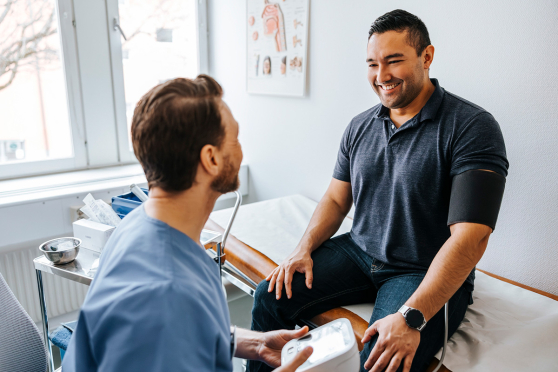 A man sitting in a doctor's office